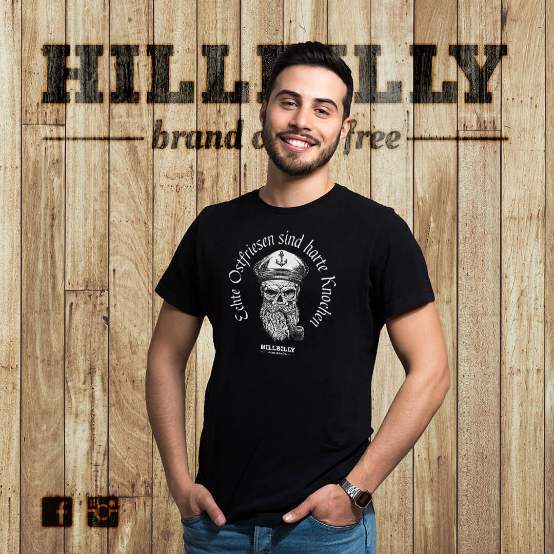 Mens_T-Shirt_HILLBILLY_SkullCaptain-HarteKnochen-black_01 Premium T-Shirt Unisex - Echte Ostfriesen sind harte Knochen